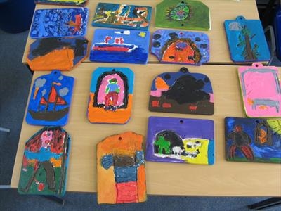 Selection of children's carved plywood tablets