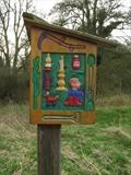 Panel two of Belles in the Wood by Jeremy Turner, Wood, carved wood relief panel