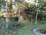 The BAB Totem Poles at Inter-Action, Milton Keynes by Jeremy Turner, Sculpture, Oak